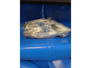 Reflektor Lampa przednia lew. NISSAN LEAF 10-17