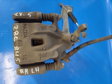 Zacisk hamulcowy tyl. lew. MAZDA CX-5 (KE) 11-17