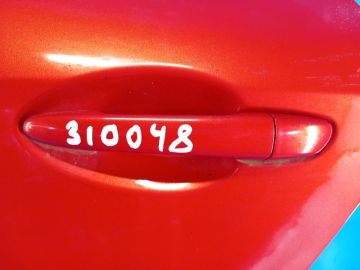 Zewnętrzna klamka drzwi tyl. lew. MAZDA 3 BL 09-13