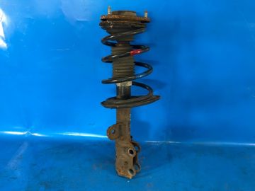 Amortyzator przed. lew. TOYOTA PRIUS PLUS 11-14