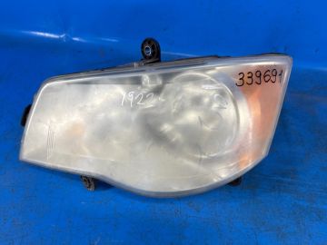 Reflektor Lampa przednia lew. DODGE GRAND CARAVAN 08-