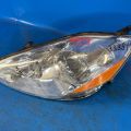 81150AE030 | Reflektor Lampa przednia lew. TOYOTA SIENNA 03-10 (339811)