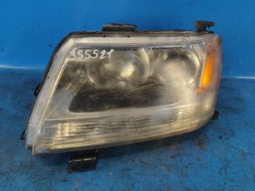 Reflektor Lampa przednia lew. SUZUKI GRAND VITARA 05-15