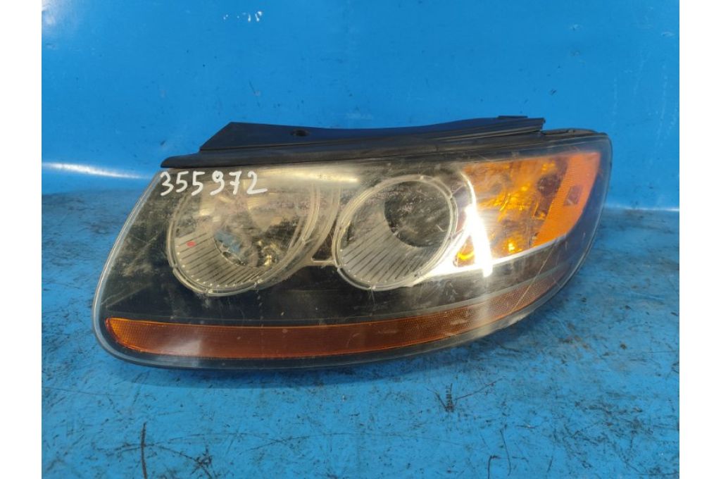 921010W050 | Reflektor Lampa przednia lew. HYUNDAI SANTA FE (CM) 05-12 (355972)
