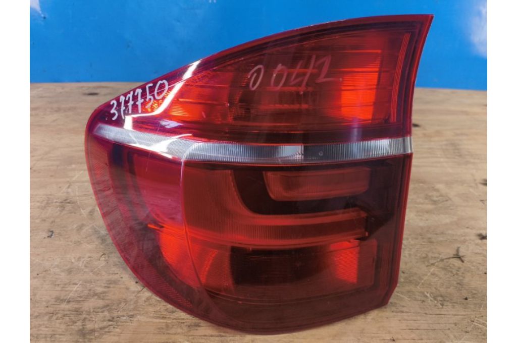 63217227791 | Lampa Tylna lew. BMW X5 (E70) 07-13 (377750)